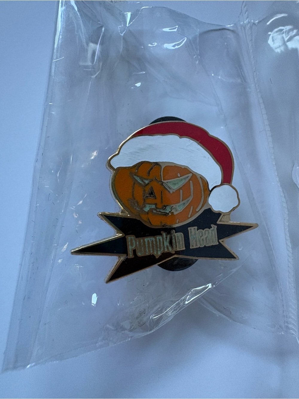 Disney Pumpkin Head Pin with Red & White Santa Hat
